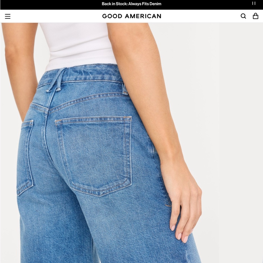 Good American Denim Bermuda Shorts in Medium Blue with Frayed Hem - Picture 2 of 7